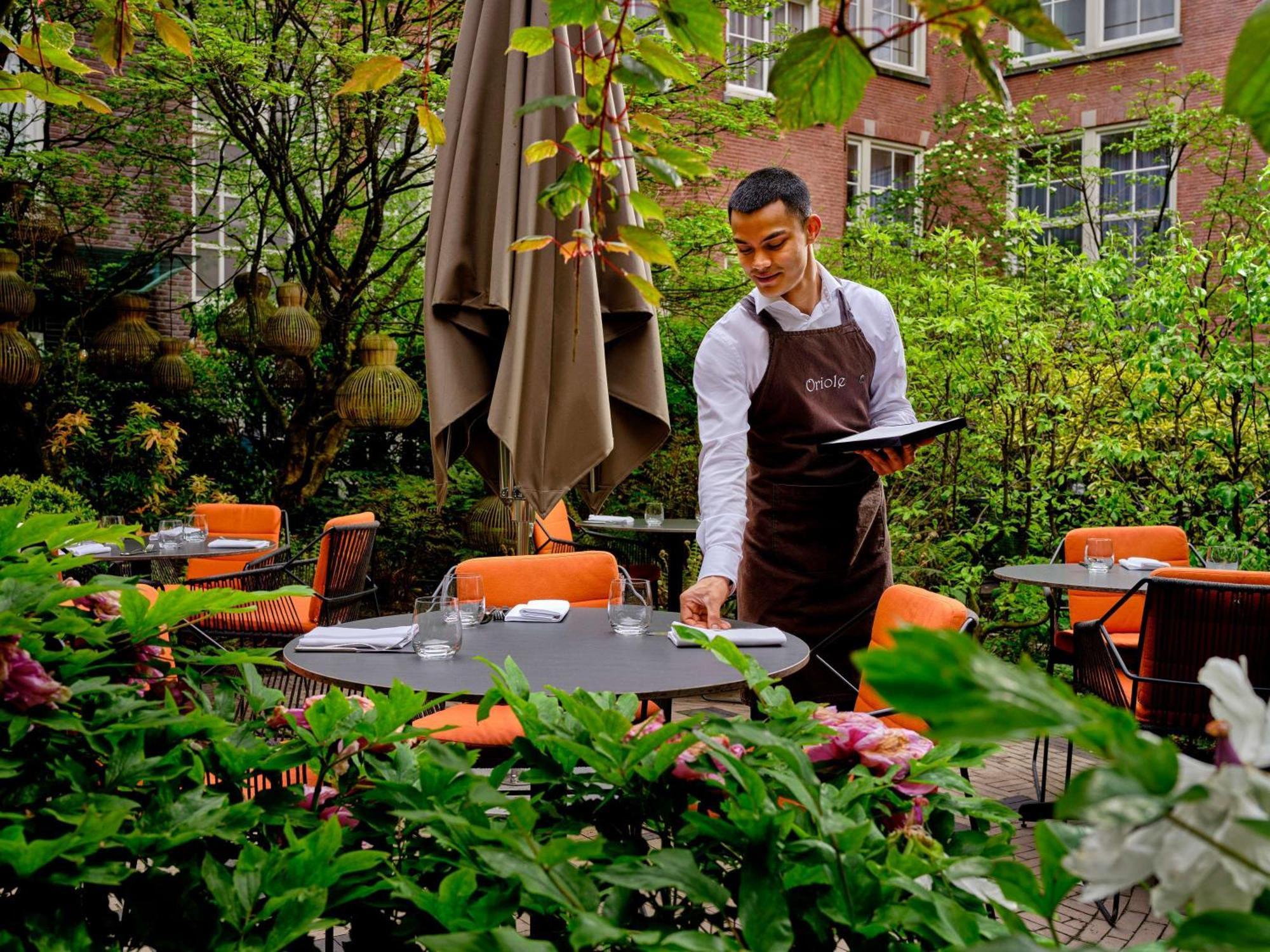 소피텔 레전드 그랜드 암스테르담 호텔 외부 사진 The garden at the restaurant